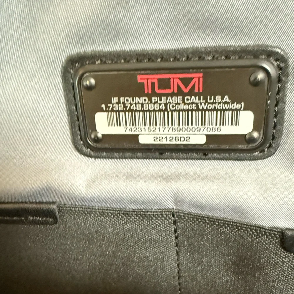 Tumi Black Duffel Bag with Adjustable Shoulder Strap